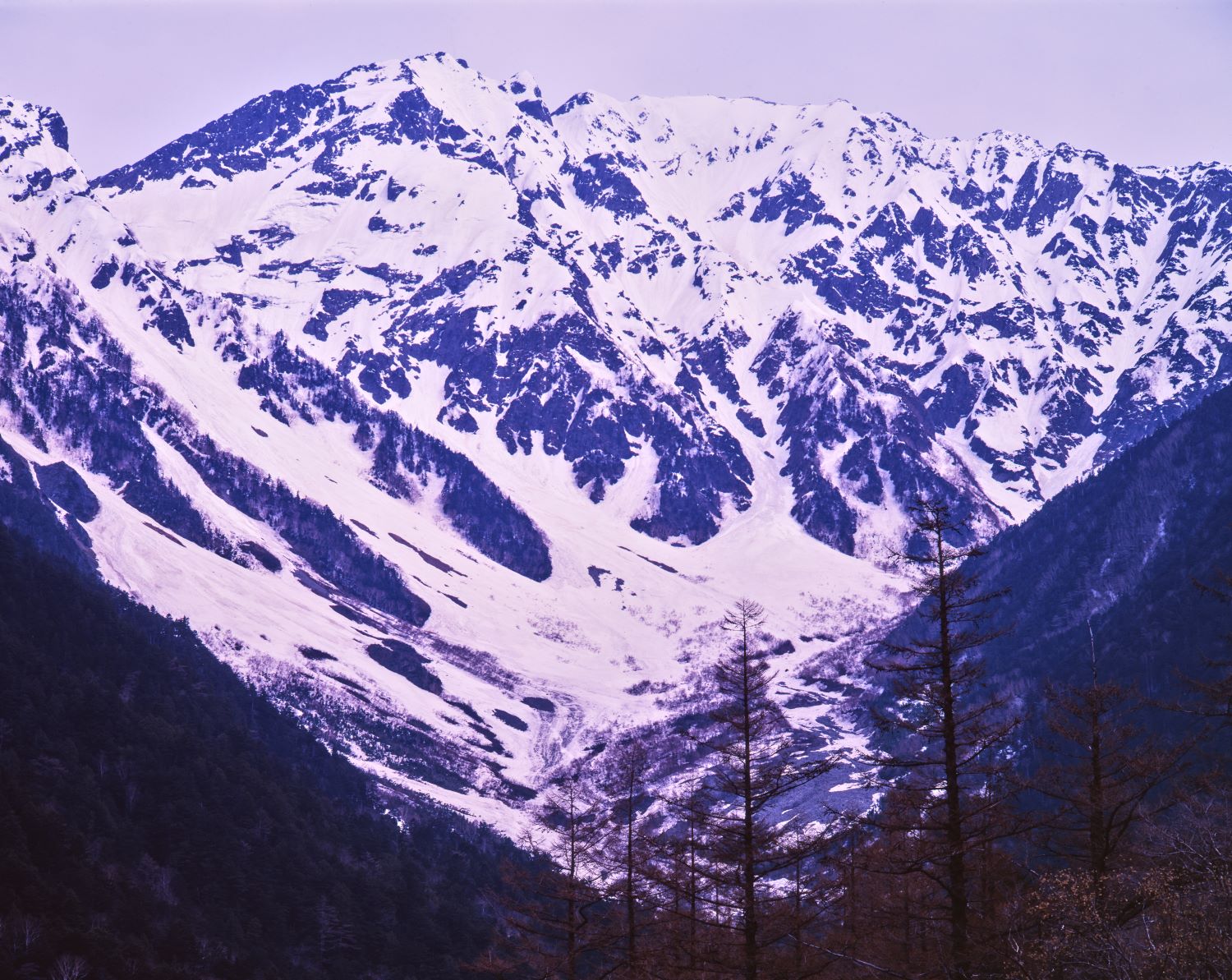 The snow-covered valleys and gullies of Mount Okuhotaka, A late autumn view of snow-capped mountains from Kamikochi